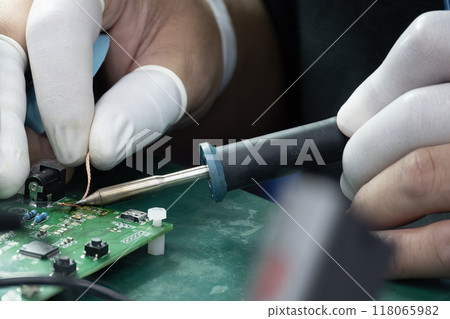 Close up scene the soldering operation by skill operator. 118065982