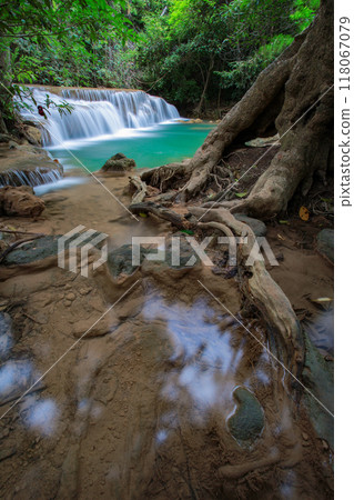 Deep forest Waterfall in Kanchanaburi, Thailand Deep forest Waterfall in Kanchanaburi, Thailand 118067079