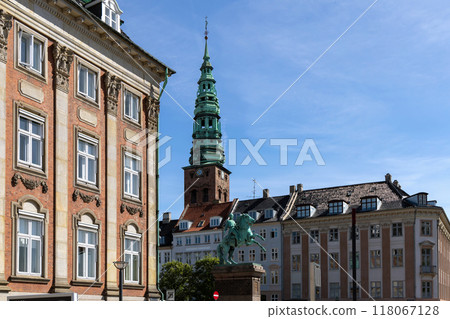 Downtown Copenhagen with old houses and church. Downtown Copenhagen with old houses and church. 118067128