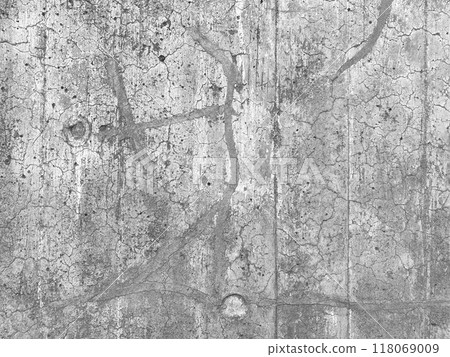 A deteriorated concrete wall. The wall of a 60-year-old building. Black and white. 118069009