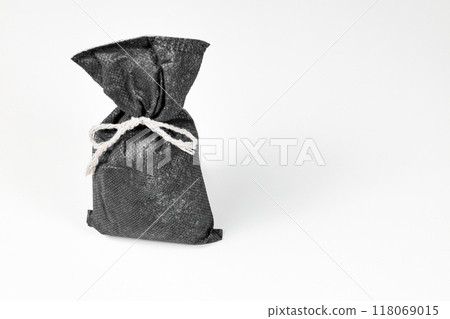 air purify charcoal bag, activated carbon moisture absorber and odor eliminator bag for maintain freshness and clear smell isolated on white background. 118069015