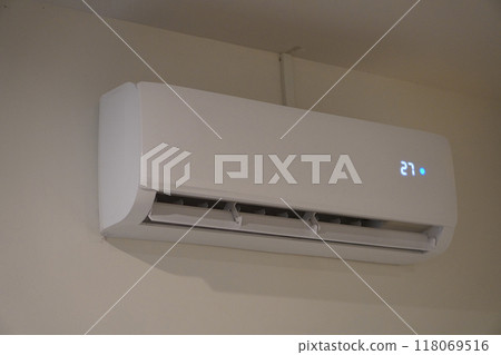 air conditioner at a temperature of 27 degrees. wall cement background, object, technology, comfortable, decor, copy space 118069516