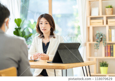 Female businesswoman: Financial planner giving advice Female businesswoman: Financial planner giving advice 118070629