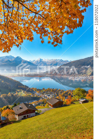 Incredible view of the meadows and mountains around Zell lake or Zeller See Incredible view of the meadows and mountains around Zell lake or Zeller See 118072022
