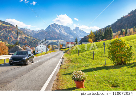 Captivating view of  Alpine green fields and traditional wooden houses in Lindenthal village near Abtenau. 118072024