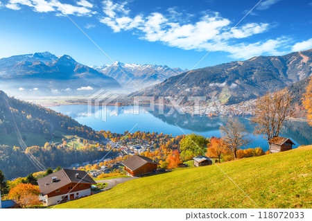 Spectacular view of the meadows and mountains around Zell lake or Zeller See . Spectacular view of the meadows and mountains around Zell lake or Zeller See . 118072033