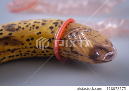 Condom and banana Condom and banana 118072575