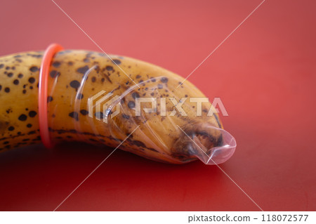 Condom and banana Condom and banana 118072577