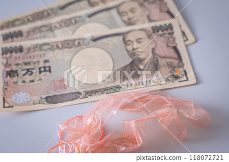 Money and condoms 118072721