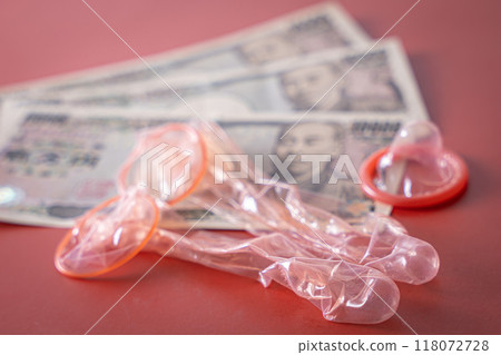 Money and condoms 118072728