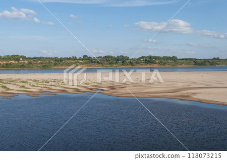 River with a large sandy beach River with a large sandy beach 118073215
