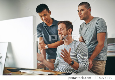 We did a good job on this one. Cropped shot of three designers working together on a project in an office. We did a good job on this one. Cropped shot of three designers working together on a project in an office. 118074249