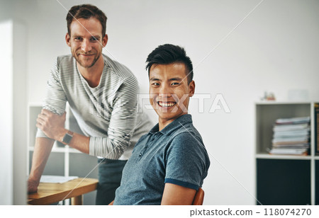 We just love a good challenge. Cropped shot of two designers working together on a project in an office. We just love a good challenge. Cropped shot of two designers working together on a project in an office. 118074270