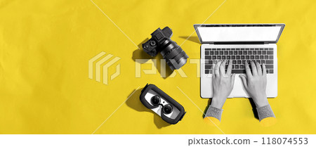 Laptop computer with a SLR camera and VR 118074553