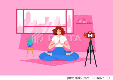 Woman shooting yoga video tutorial 118075085