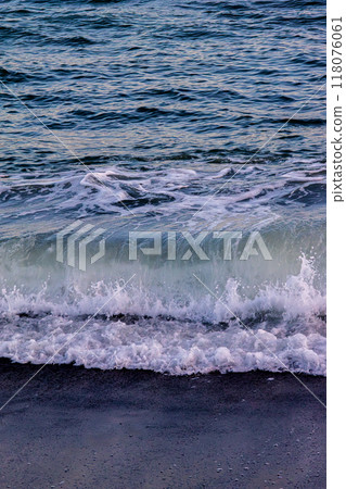 lapping white waves 118076061