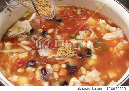Minestrone: Stir-fry vegetables in a pan Minestrone: Stir-fry vegetables in a pan 118076513