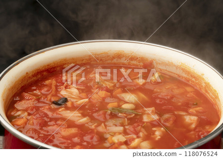 Minestrone simmered in a pot 118076524