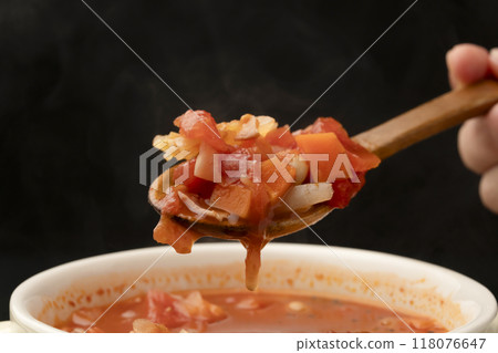 Minestrone soup cup lifted with spoon Minestrone soup cup lifted with spoon 118076647
