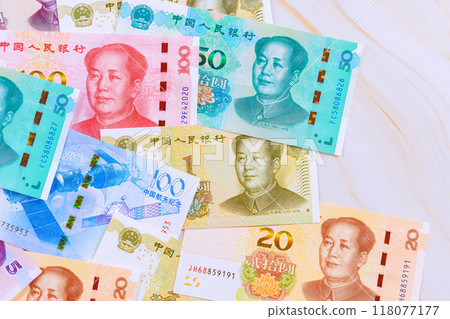 In Chinese economy, paper money is used to represent yuan as cash banknote at various denominations 118077177