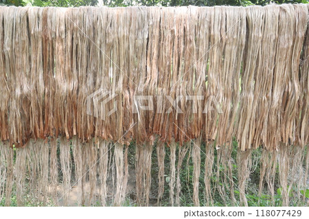 golden fiber jute and stick stock 118077429
