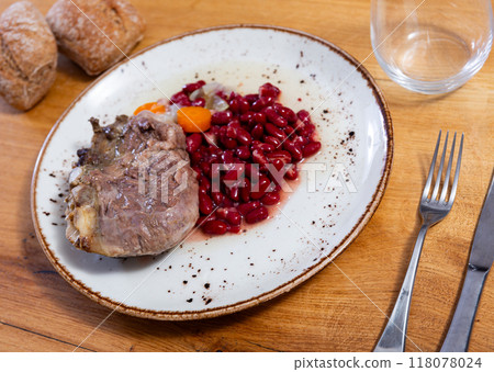 Baked pork cheek with stew of red kidney beans Baked pork cheek with stew of red kidney beans 118078024