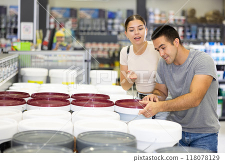Husband buyer doubts choice consults with wife about purchase aqueous emulsion ink bucket 118078129