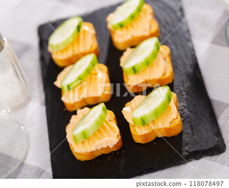 Tasty snack before lunch - sandwiches with cucumber and pate Tasty snack before lunch - sandwiches with cucumber and pate 118078497