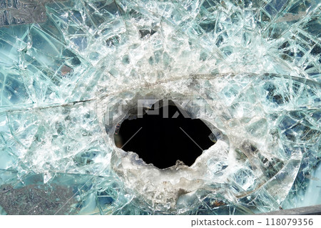 Kyiv, Ukraine July 6, 2024: A broken armored glass of an armored vehicle after a battle Kyiv, Ukraine July 6, 2024: A broken armored glass of an armored vehicle after a battle 118079356