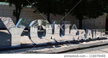 Kyiv, Ukraine July 6, 2024: Huge mirrored letters in the center of Kyiv Youkraine Kyiv, Ukraine July 6, 2024: Huge mirrored letters in the center of Kyiv Youkraine 118079408