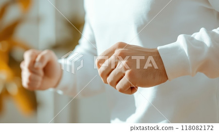 Person with Diabetes Checking Their Blood Sugar After Monitoring with Medical Device 118082172