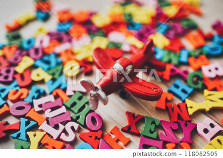 Colorful alphabet and red plane Colorful alphabet and red plane 118082505