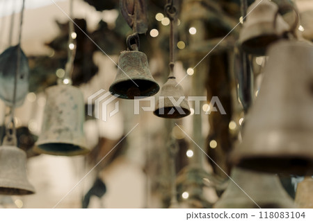 A beautiful display of hanging antique bells A beautiful display of hanging antique bells 118083104