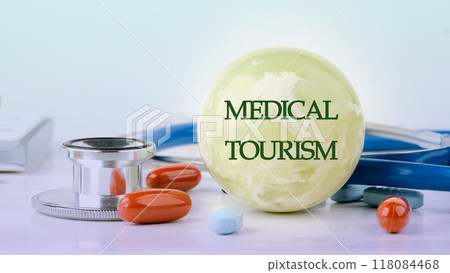 MEDICAL TOURISM written on the ball, front view MEDICAL TOURISM written on the ball, front view 118084468
