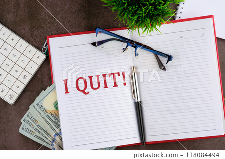 Life and business motivational inspirational concept. I QUIT there is an important text in the business book 118084494