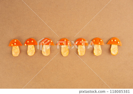 mushrooms craft cut out of tangerine peel 118085381