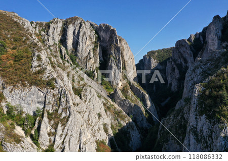 Aerial view of a deep limestone gorge, canyon 118086332