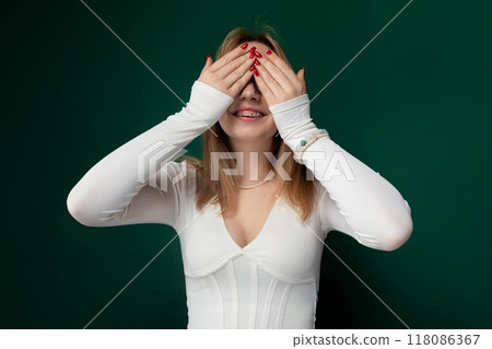 Woman Covering Her Eyes in Distress Woman Covering Her Eyes in Distress 118086367