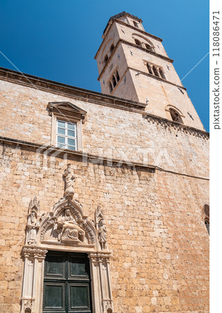 Church and bell tower of the Franciscan friary situated at the Stradun, the main street of Old town Dubrovnik in Croatia Church and bell tower of the Franciscan friary situated at the Stradun, the main street of Old town Dubrovnik in Croatia 118086471