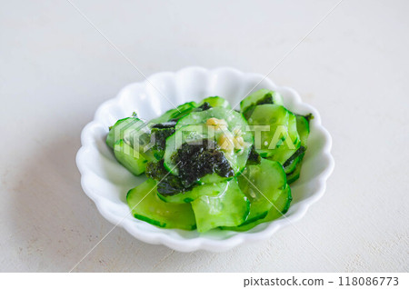 Salted cucumber with seaweed and wasabi Salted cucumber with seaweed and wasabi 118086773