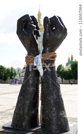 Kyiv, Ukraine June 23, 2022: The Tied Hands monument in the city of Kyiv in memory of the dead people in Mariupol during the Russian invasion of Ukraine 118087064