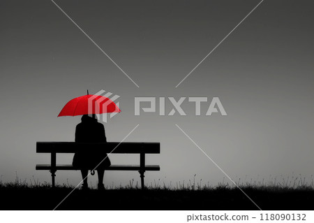 silhouette a person sitting on a bench in the rain, holding an umbrella above their head. 118090132