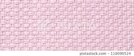Texture light pink background from woven textile material with wicker pattern, macro. Vintage rose fabric cloth 118090524