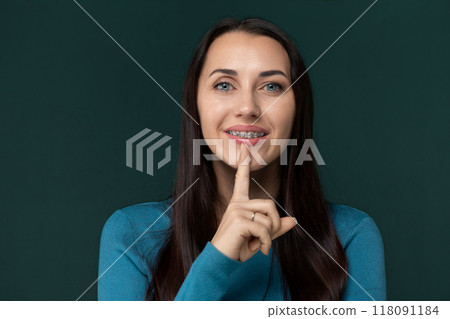 Woman Making a Hush Gesture 118091184