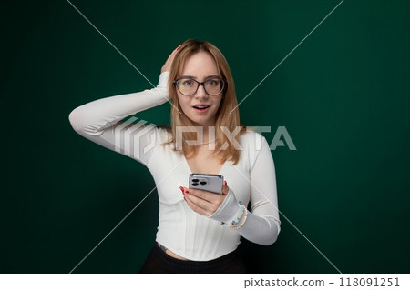Woman With Glasses Holding Cell Phone 118091251