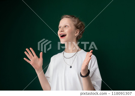 Woman in White Shirt Holding Out Hands Woman in White Shirt Holding Out Hands 118091307