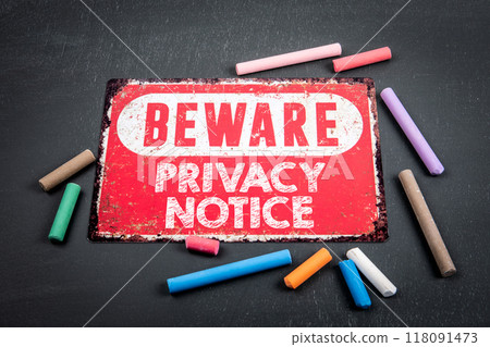 Privacy Notice. Beware sign with text and colored pieces of chalk on a dark chalkboard background Privacy Notice. Beware sign with text and colored pieces of chalk on a dark chalkboard background 118091473