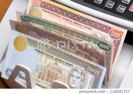 Turkmenistani manat in the counting machine Turkmenistani manat in the counting machine 118091757