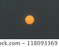 The sun on a day with a lot of smoke in the sky caused by fires 118093369