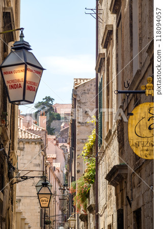 Staircased narrow cobblestone alley in the medieval old town of Dubrovnik in Dalmatia, Croatia Staircased narrow cobblestone alley in the medieval old town of Dubrovnik in Dalmatia, Croatia 118094057